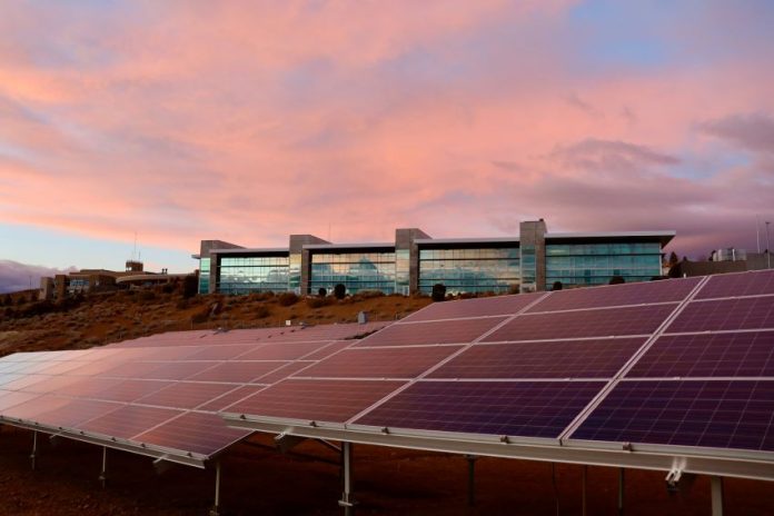 Photo of a solar panel during the sunset